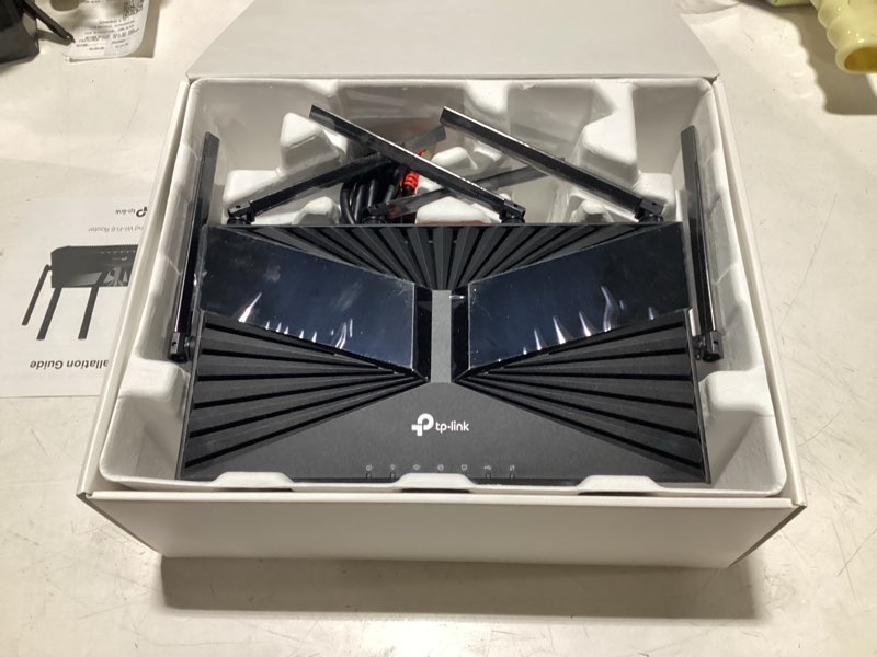 Condition photo showing As Is for dual-band gigabit wi-fi 6 router