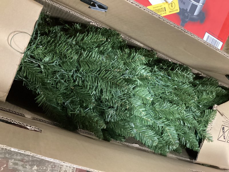 Condition photo showing Good Condition for National Tree Company 6.5 ft Pre-Lit North Valley Spruce Artificial Christmas Tree, 450 Clear Lights, 816 Tips, Includes Stand, Green