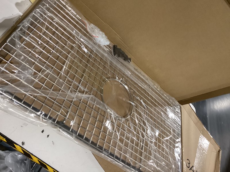 Condition photo showing Good Condition for 26.2 in. x 14.2 in. Centre Drain Sink Protector with Supersoft Silicone Feet in 304 Grade Stainless Steel