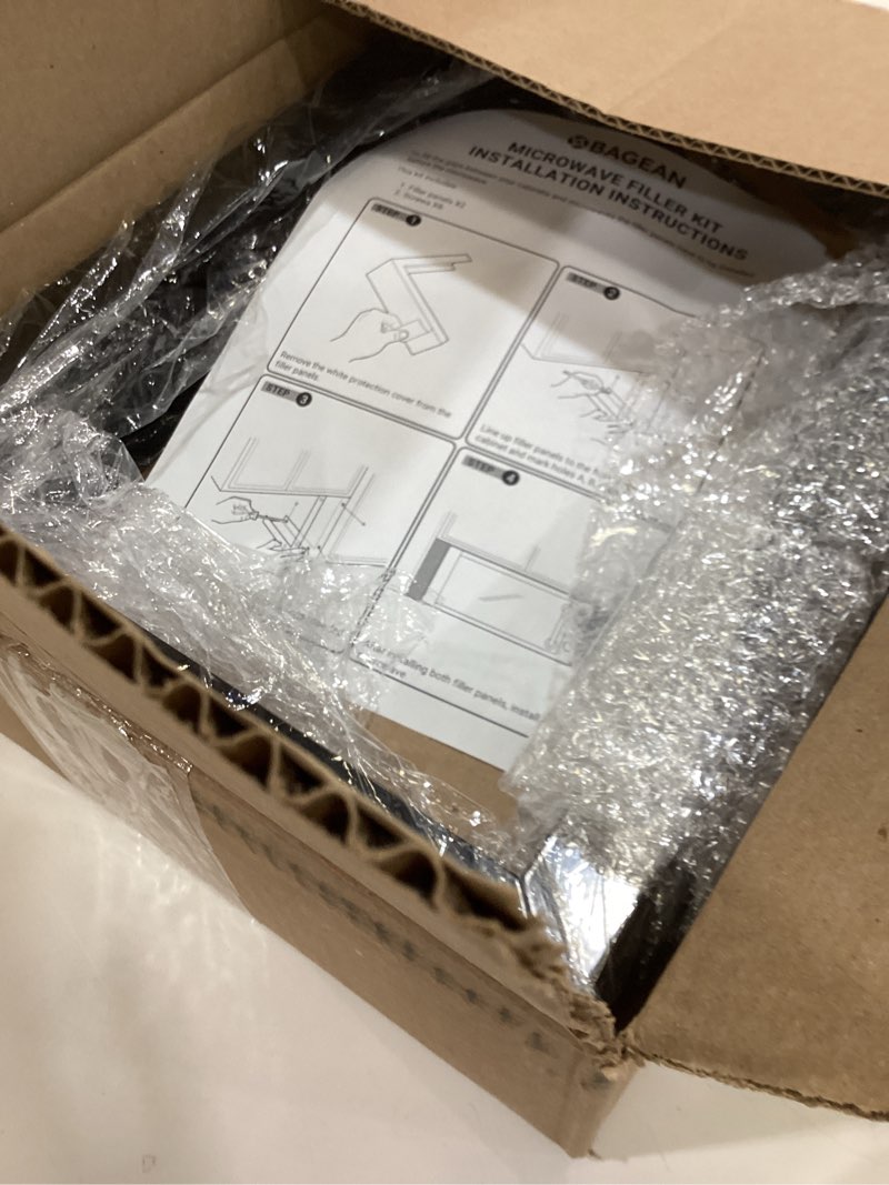 Condition photo showing Good Condition for Universal Microwave Trim Kit - Black metal Microwave Filler Kit Fits Most Built In Microwaves- Fills Over the Range Microwave Oven Cabinet Gap - 15.75”D x 10.75”H x 2.95”W 15.75”H x 10.75”D x 2.95"W Black