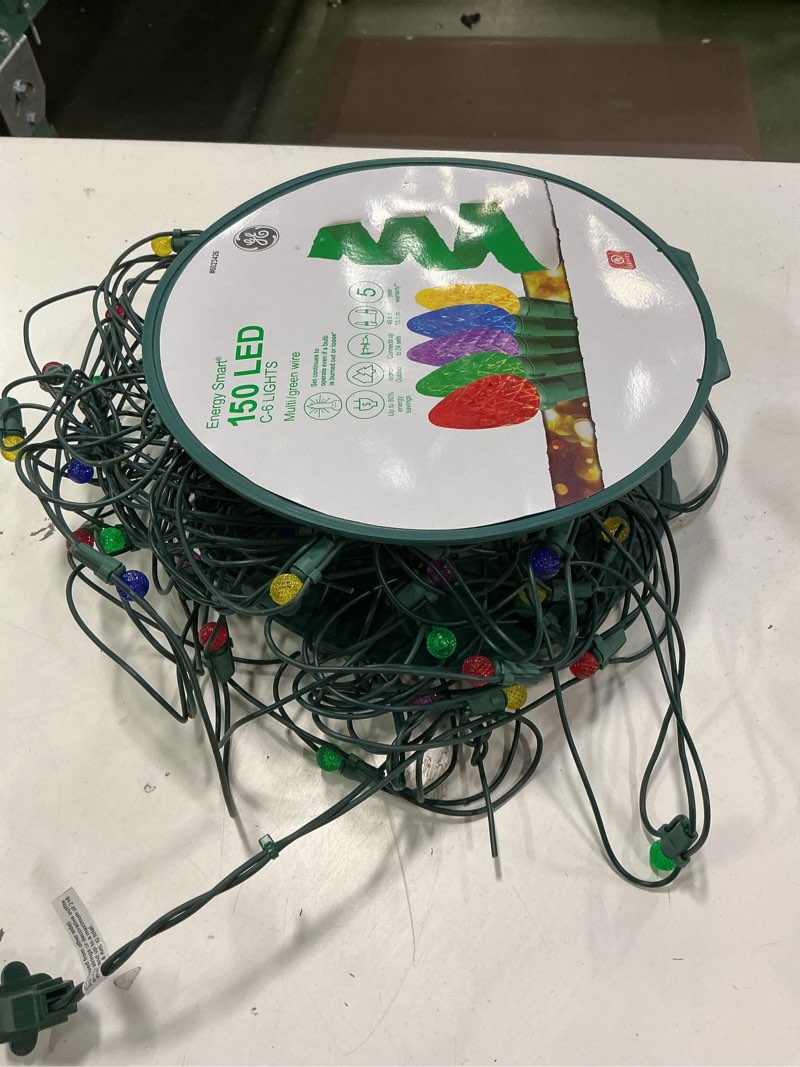 Condition photo showing As Is for Ge 150 LED c-6 lights multi green wire