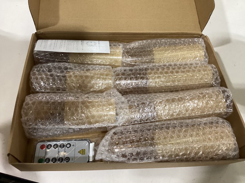 Condition photo showing As Is for kakoya flameless led candles upgraded realistic flickering flame,7pcs battery operated candles with remote timers,led pillar candles for home decor,christmas,and parties?gold? gold 7 pack