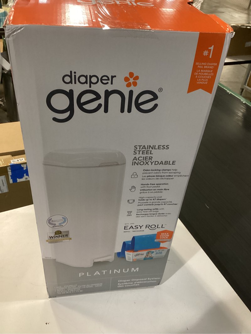 Condition photo showing New/Like New for diaper genie platinum pail (lily white) is made in durable stainless steel and includes 1 easy roll refill with 18 bags that can last up to 5 months.