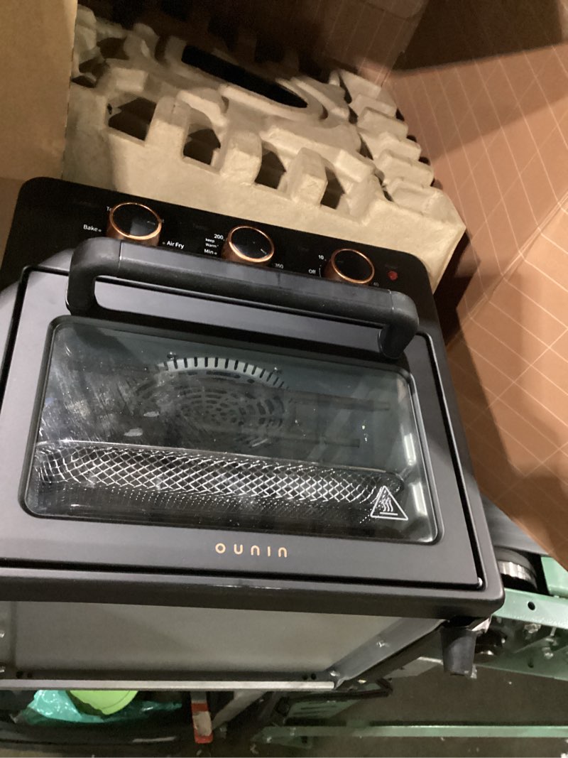 Condition photo showing As Is for our place wonder oven pro | 8-in-1 digital air fryer & countertop oven with basket, rack, pan & tray | 3-rack, 32 qt capacity - air fry, toast, roast, bake, reheat, broil, proof & dehydrate | char 32 quarts char