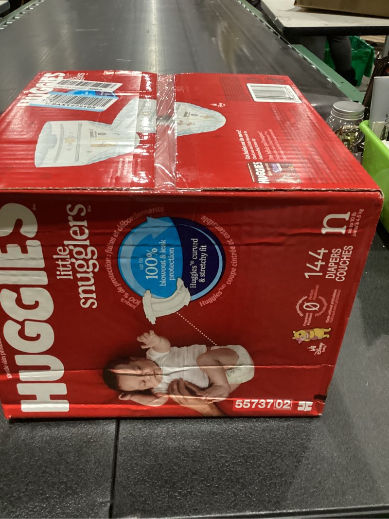 Condition photo showing New/Like New for Huggies Size Newborn Diapers, Little Snugglers Baby Diapers, Size Newborn (up to 10 lbs), 144 Count, Packaging May Vary