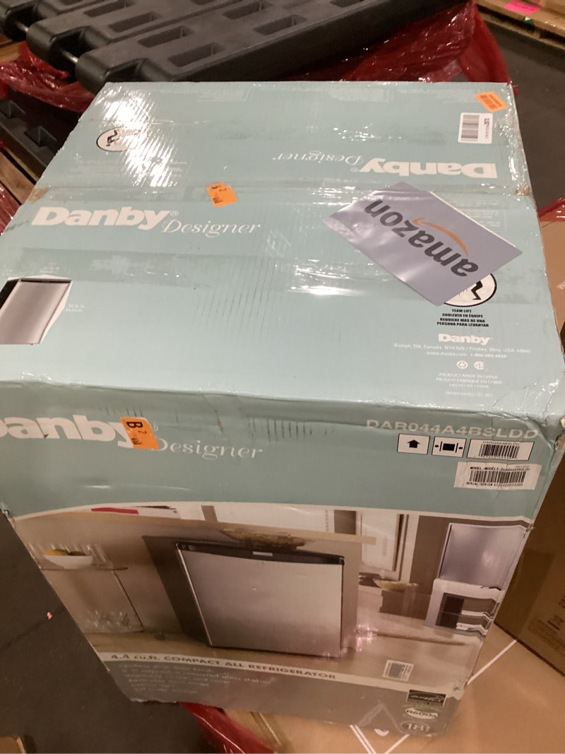 Condition photo showing As Is for Danby DAR044A4BSLDD 4.4 cu. ft. Compact Fridge in Stainless Steel