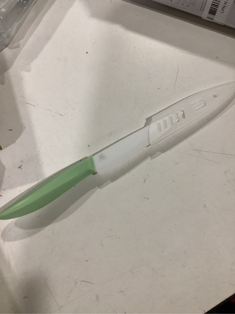 Condition photo showing New/Like New for durable ceramic knife for chopping vegetables & fruits, 4” non-reactive and professional ceramic chef knife for clean cutting, rust-proof sharp blade with ergonomic handle, gift-ready kitchen knives 4 inch