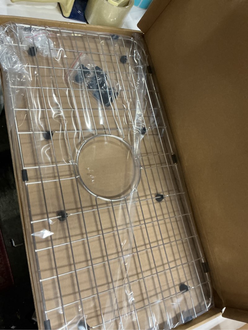 Condition photo showing New/Like New for Serene Valley Sink Bottom Grid 24-1/8" x 12-5/8", Centered Drain with Corner Radius 1-1/2", Sink Protector NLW2412C