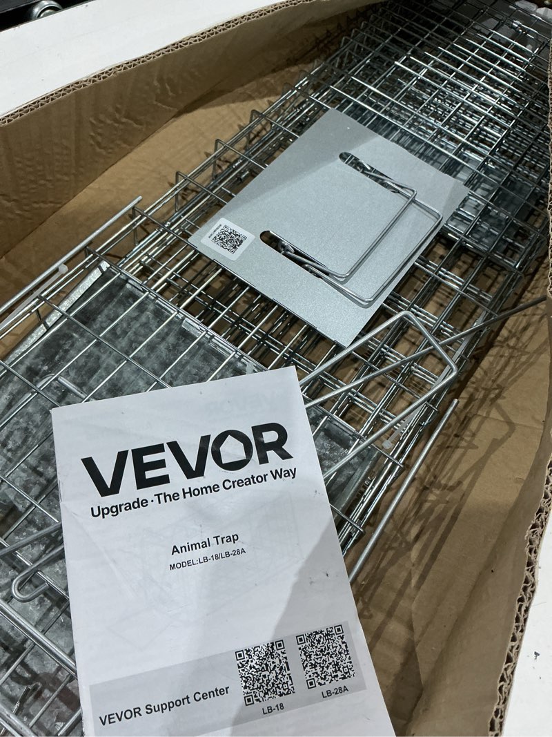 Condition photo showing As Is for vevor,animal  trap. large collapsible humane live animal cage trap for raccoon, opossum, stray cat, rabbit, groundhog and armadillo