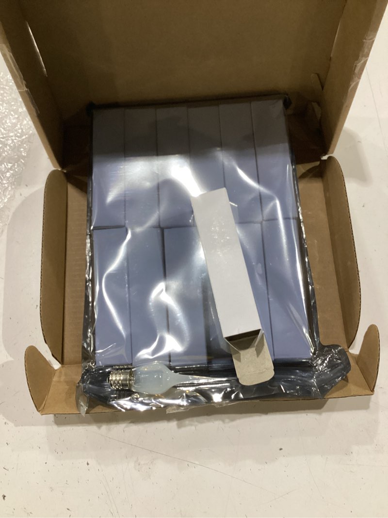 Condition photo showing New/Like New for 12 pack mini silicone dipped candle light bulbs, 3 watt e12 candelabra base, 2700k warm yellow flame tip decorative bulbs for country style window candles, night lights and chandeliers 12 3 watt