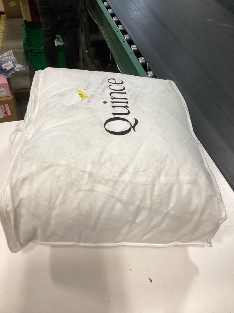 Condition photo showing As Is for full/queen premium down alternative comforter