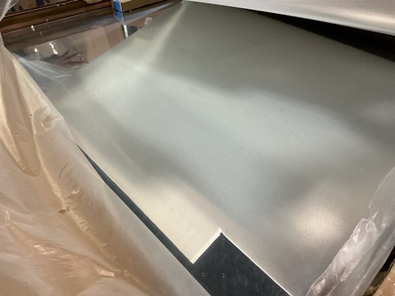 Condition photo showing Good Condition for LOAAO 24X32 Inch Bathroom Mirror with Wood Grain Colored Metal Frame, Rounded Rectangle Metal Framed Bathroom Mirror, Anti-Rust, Hangs Horizontally or Vertically Wood Grain Colored 24"L x 32"W