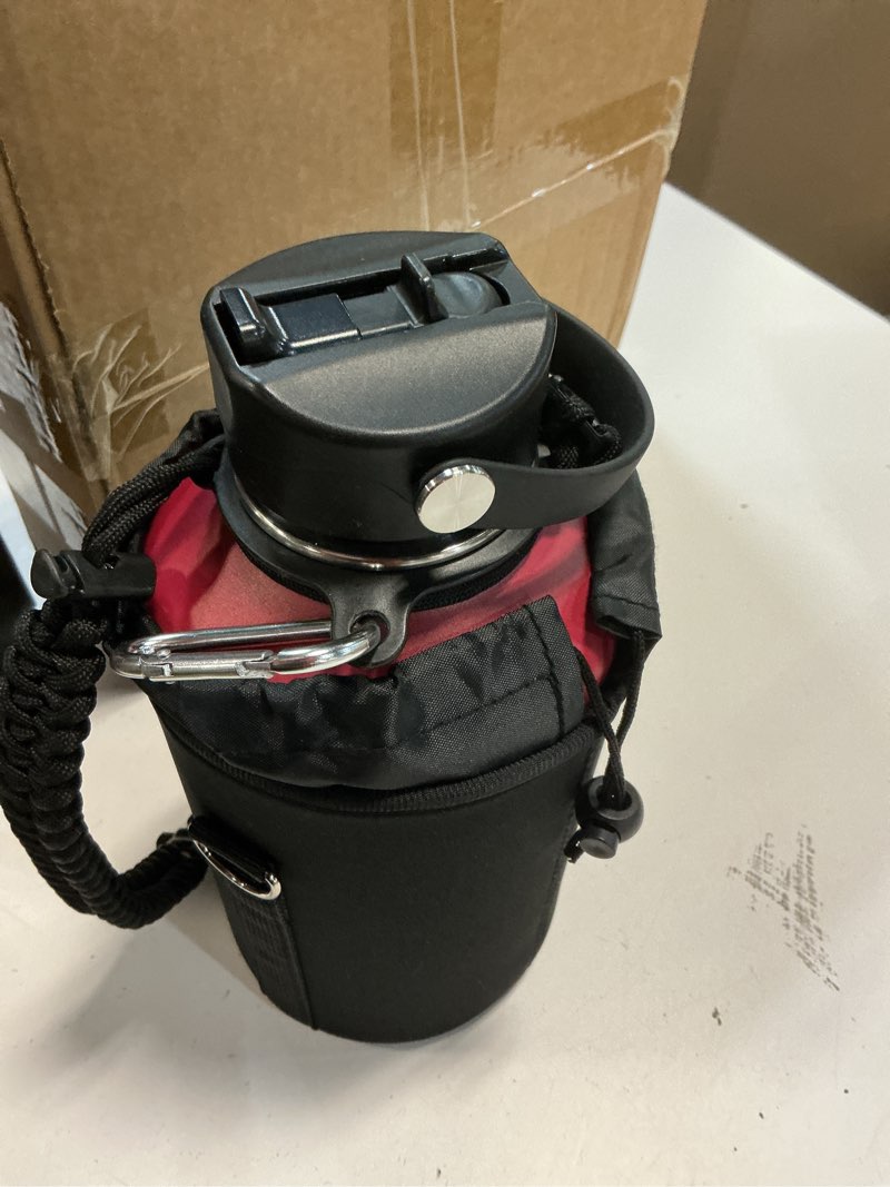 Condition photo showing Good Condition for water bottle insulated 32oz 40oz 64oz 128oz straw lid spout lid & 3 lids, leak proof, vacuum insulated,stainless steel water bottle wide mouth for sports, gym or office 64 ounces dark rainbow
