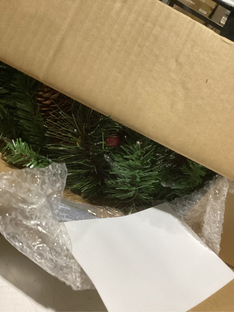 Condition photo showing Good Condition for National Tree Company 24 in Pre-Lit Crestwood Spruce Artificial Christmas Wreath, Christmas Decoration with Glitter, Pinecones, Red Berries, 50 Clear Lights, 160 Tips, Green 24 in Plug In Wreath