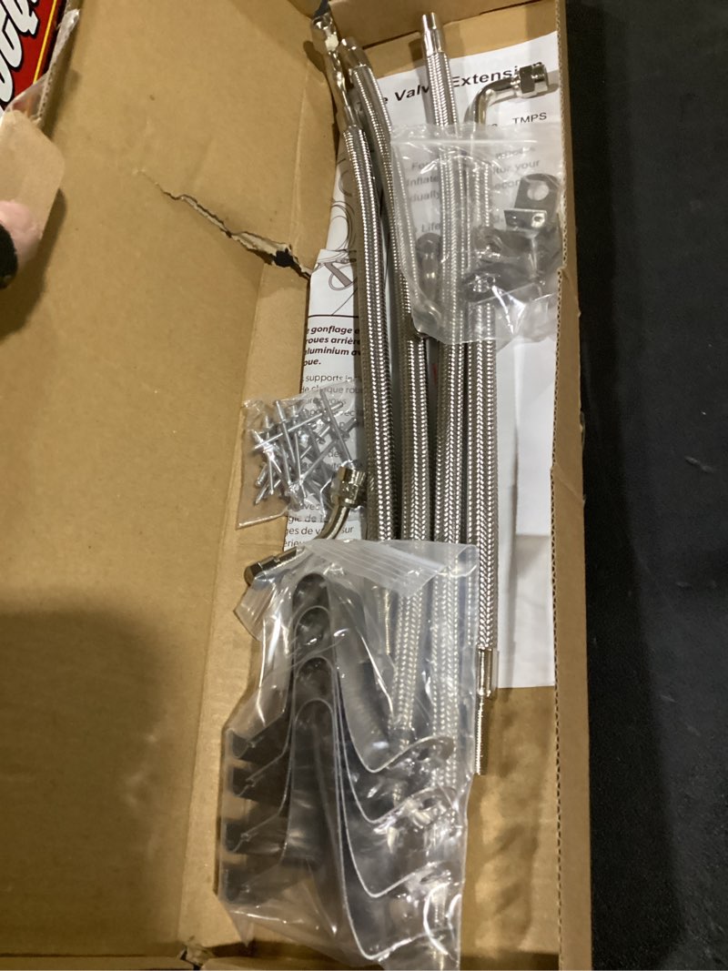 Condition photo showing Good Condition for dually valve stem extenders kit, stainless steel braided valve stem extension fits 16" to 19-1/2" dual wheels tire valve extension for most cars motorhome rvs trailers trucks 2-set