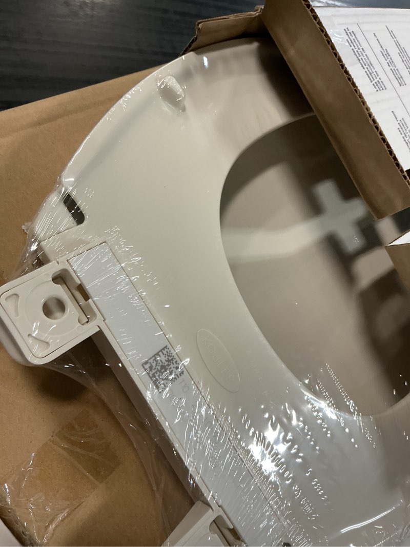 Condition photo showing Good Condition for kohler 20110-96 brevia, slow close toilet seat, elongated toilet seat, grip-tight bumpers quick-attach hardware, biscuit biscuit elongated quiet-close