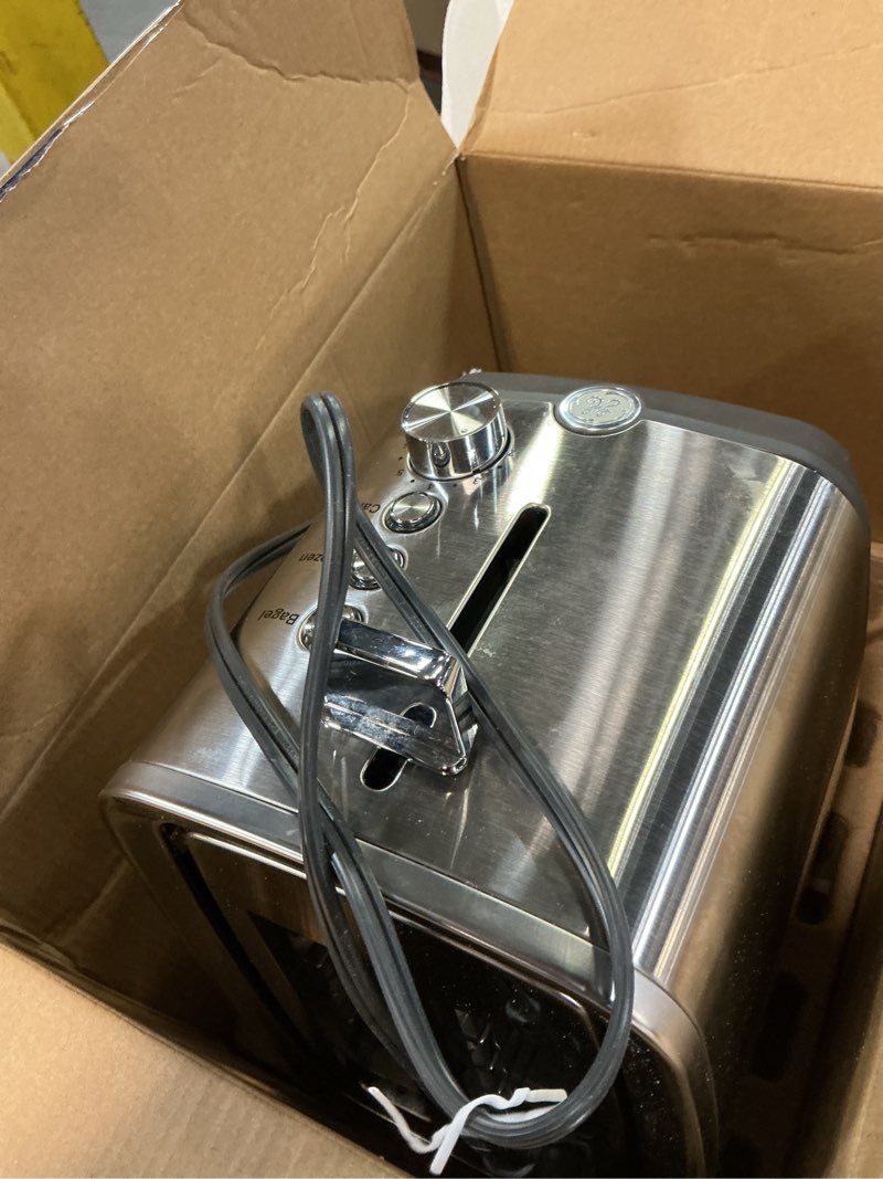 Condition photo showing As Is for ge 2 slice stainless steel toaster, extra wide slots for toasting bagels, breads, waffles & more, 7 adjustable shade settings, removable crumb tray, countertop kitchen essentials, 850 watts 2-slice stainless steel