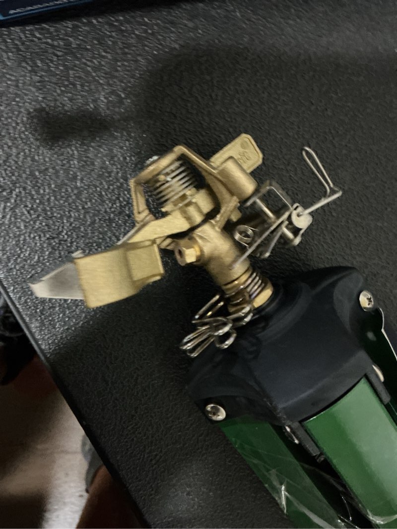 Condition photo showing As Is for orbit sprinkler 5000-sq ft impulse tripod lawn sprinkler