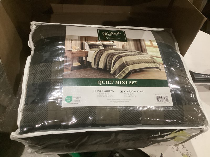 Condition photo showing New/Like New for woolrich reversible quilt set - cottage styling reversed to solid color, all season lightweight coverlet, cozy bedding layer, matching shams, oversized king/cal king, winter plains stripes taupe winter plains taupe oversized king/cal king