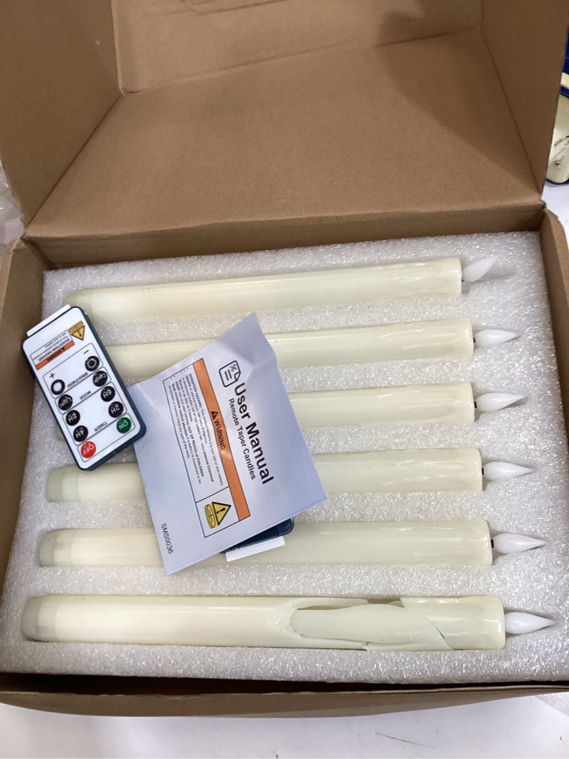 Condition photo showing As Is for homemory 24 pcs real wax flameless taper candles with remote timer and dimmer, battery operated candlesticks with flickering light, ivory window candles, 9.6 inches for wedding home decor a-ivory, 9.6 inches, 24 pcs