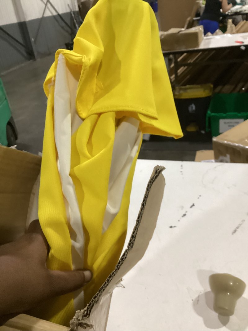 Condition photo showing As Is for tempera 9ft scalloped patio umbrellas with fringe, market umbrellas with water-resistant and fade resistant canopy, 1.5" wood pole & button tilt. beige piece spliced yellow 9 ft push-button-tilt