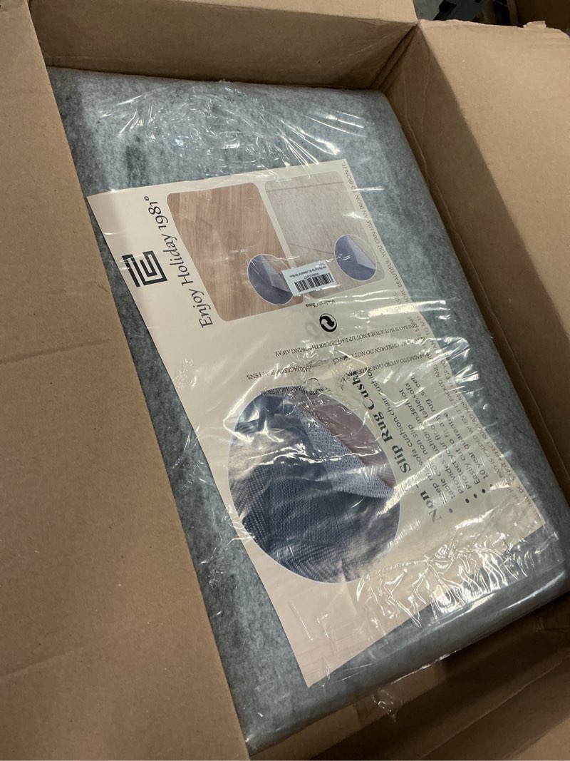 Condition photo showing As Is for Non Slip Rug Pad Grippers - 7x10 Ft, 1/8" Thick, (Felt + Rubber) Double Layers Area Carpet Mat Tap, Provides Protection and Cushioning for Hardwood or Tile Floors 7'X10' Felt + Rubber- 1/8" Thick