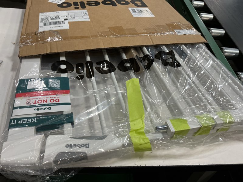 Condition photo showing New/Like New for babelio safety gate door fits for stairs, narrow and wide doorways with auto close, easy install, no drilling, pressure mounted for baby, child, pets, dog/puppy, 26''-40'', white white 30"tall 26"-40" wide