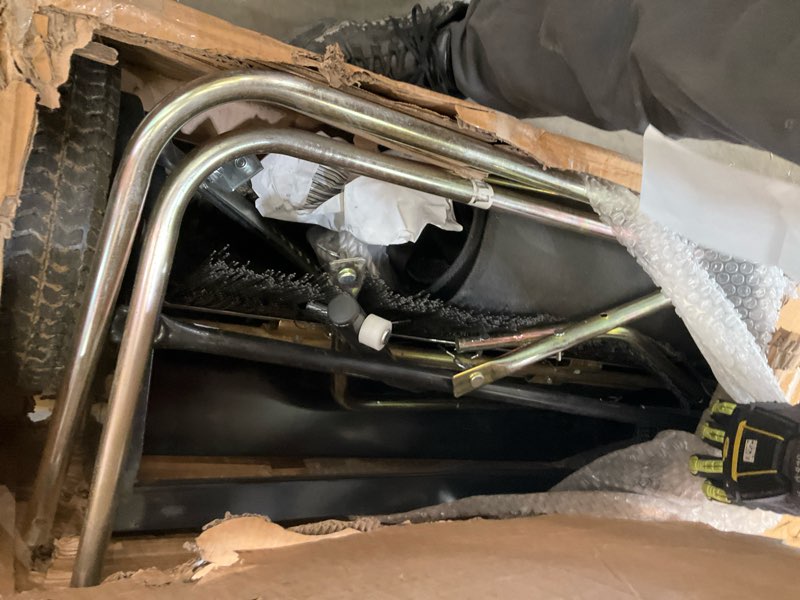 Condition photo showing As Is for lawn sweeper