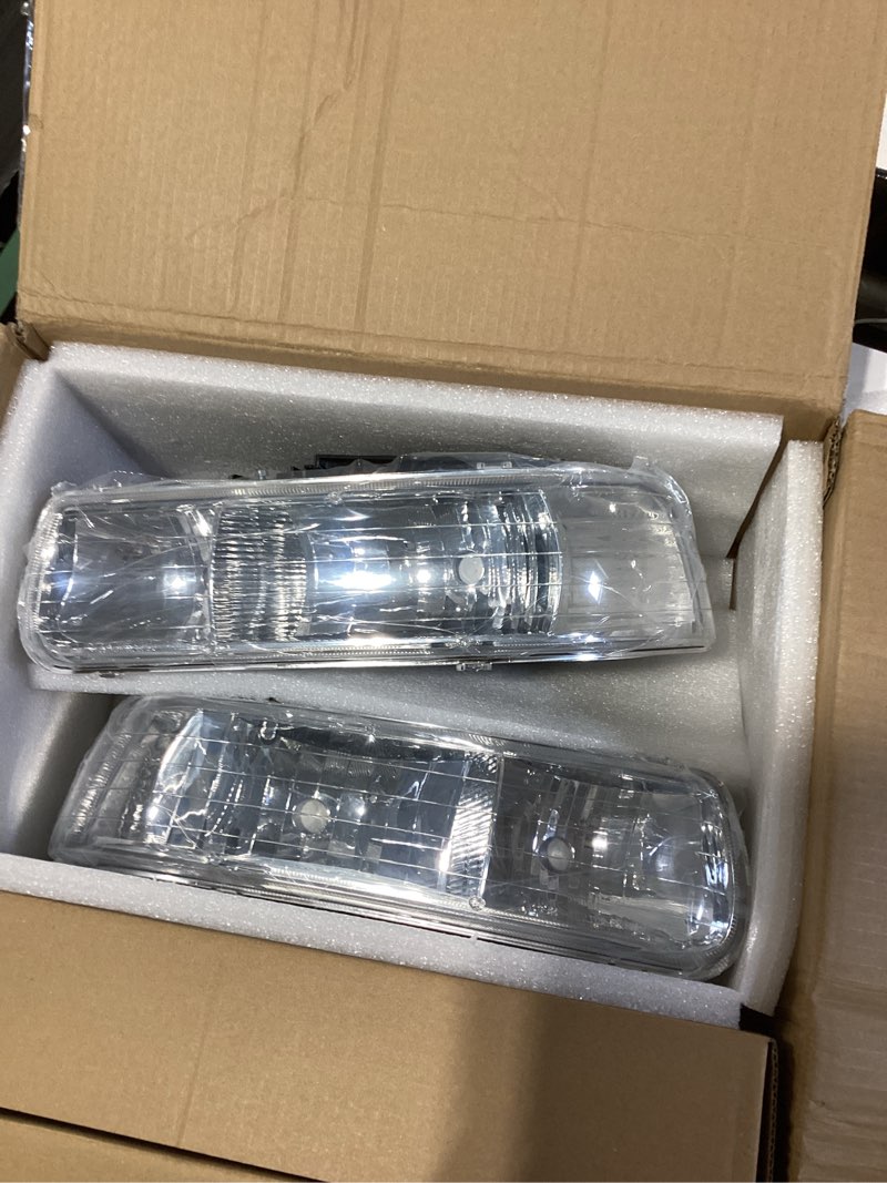 Condition photo showing Good Condition for headlight assembly for 1999-2002 chevy silverado/2000-2006 chevy suburban,2000-2006 chevy tahoe driver & passenger side, chrome housing, oe replacement (no bulbs) chrome-amber