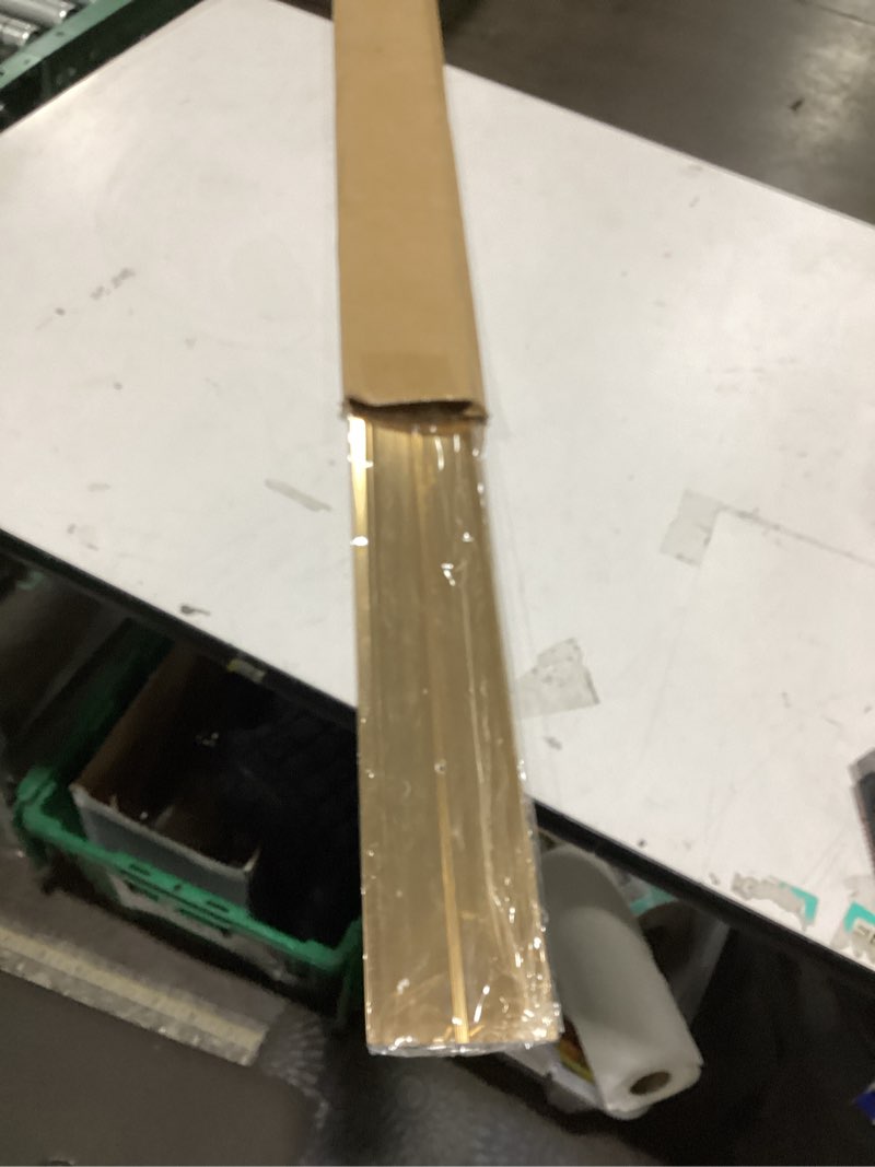 Condition photo showing As Is for raytano 36"l×4"w ×0.1"h flat profile aluminum floor transition strip, metal door threshold for carpet wood tile vinyl flooring gaps, indoor and outdoor doorway decoration protector(golden,1pcs) 36"l x 4"w(1pcs) gold