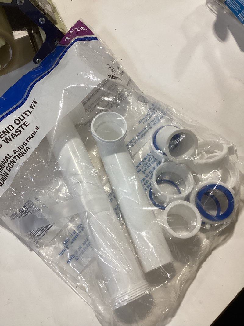 Condition photo showing As Is for dearborn 1-1/2-in plastic end outlet disposal kit
