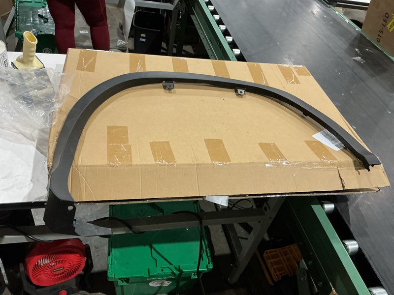 Condition photo showing Good Condition for replacement fender flare trim molding for a volkswagen tiguan