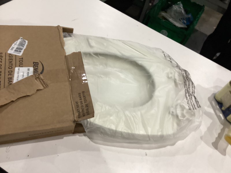 Condition photo showing Good Condition for Bemis Elongated Enameled Wood Toilet Seat in Biscuit with Easy•Clean? Hinge