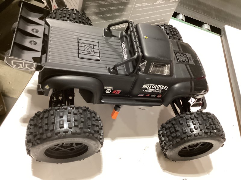 Condition photo showing As Is for ARRMA RC Truck 1/8 Notorious 4X4 6S BLX BRUSHLESS V6 Stunt Truck RTR (Battery and Charger Not Included), (Black), ARA8611V6T1
