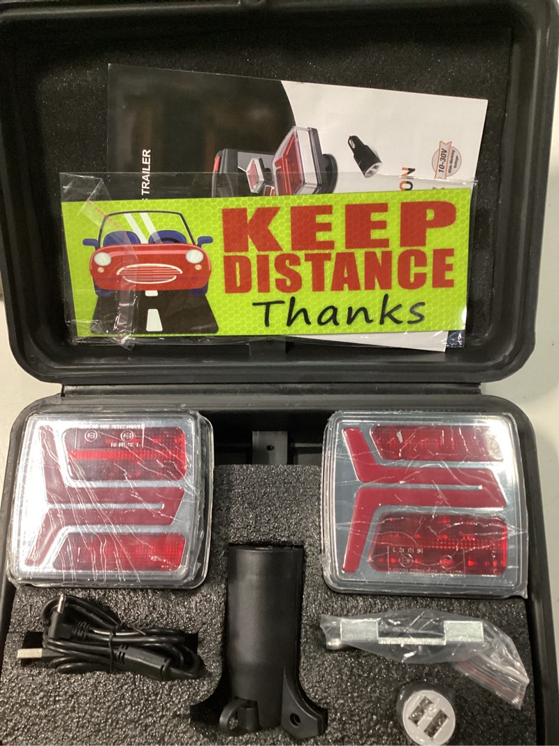 Condition photo showing New/Like New for rechargeable led wireless trailer light kit portable, magnetic trailer light for towing truck, boat trailer, caravan, camper, rv, wireless towing trailer light kit