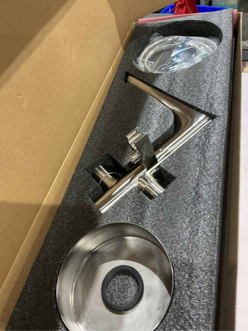 Condition photo showing Good Condition for woodbridge contemporary single handle freestanding bathtub filler faucet with hand shower in brushed nickel finish, f0014bn