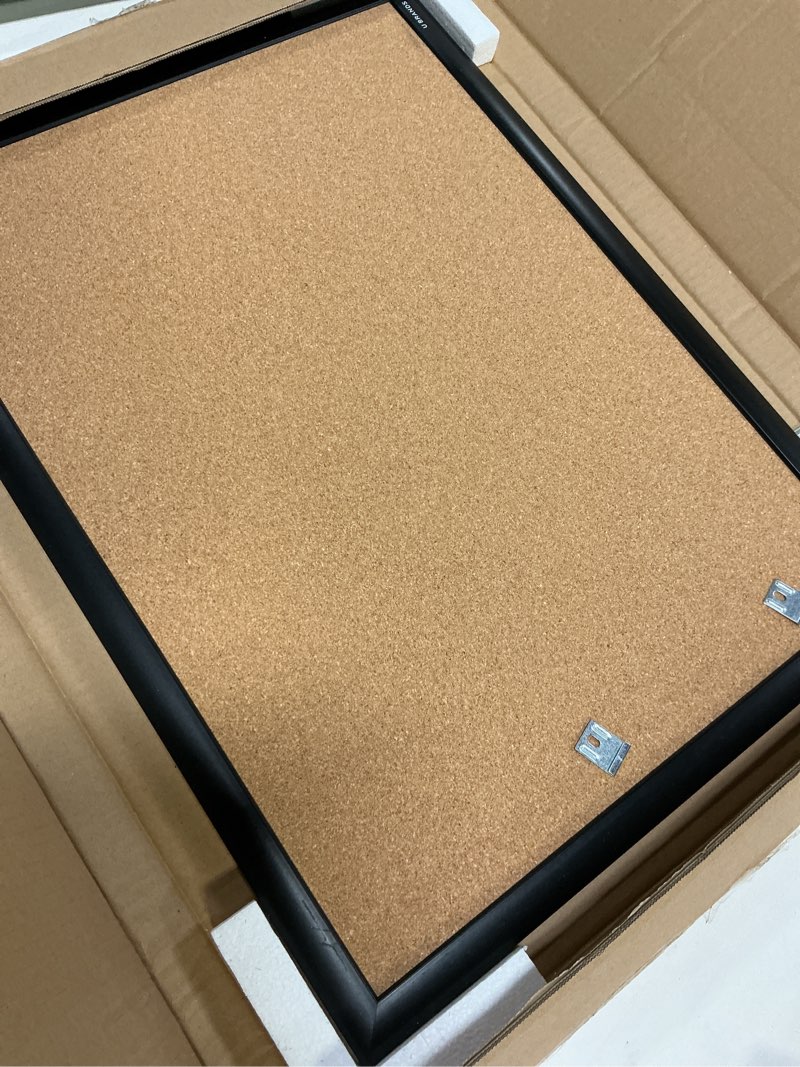 Condition photo showing Good Condition for u brands cork bulletin board, 24" x 18", black aluminum frame, industrial grade pinning surface 18" x 24"