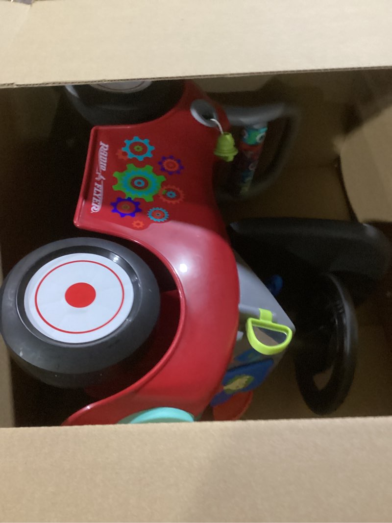 Condition photo showing Good Condition for Radio Flyer Busy Buggy, for Toddlers 1-3, 3-in-1 Push Walker Ride On Car with 17 Sensory Activities, Anti-Tip Feature, Under-Seat Storage, Horn and Gears, 42 lb Capacity, Toddler Ride On Toys Red