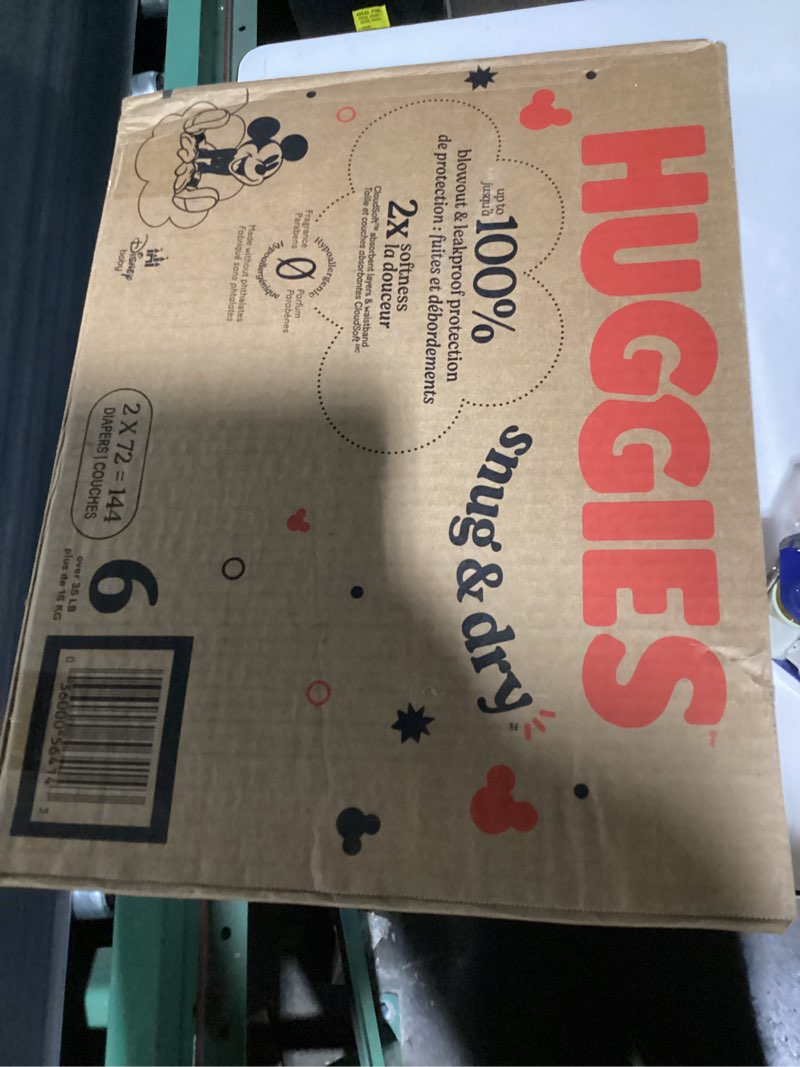 Condition photo showing New/Like New for huggies snug & dry disposable diapers - econ+ pack - size 6 - 144ct