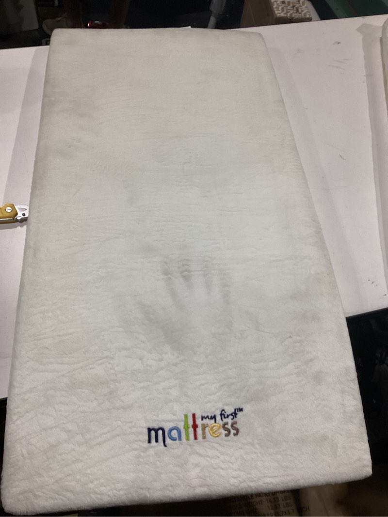 Condition photo showing As Is for my first cradle mattress pad 18" x 36" x 1-1/2"