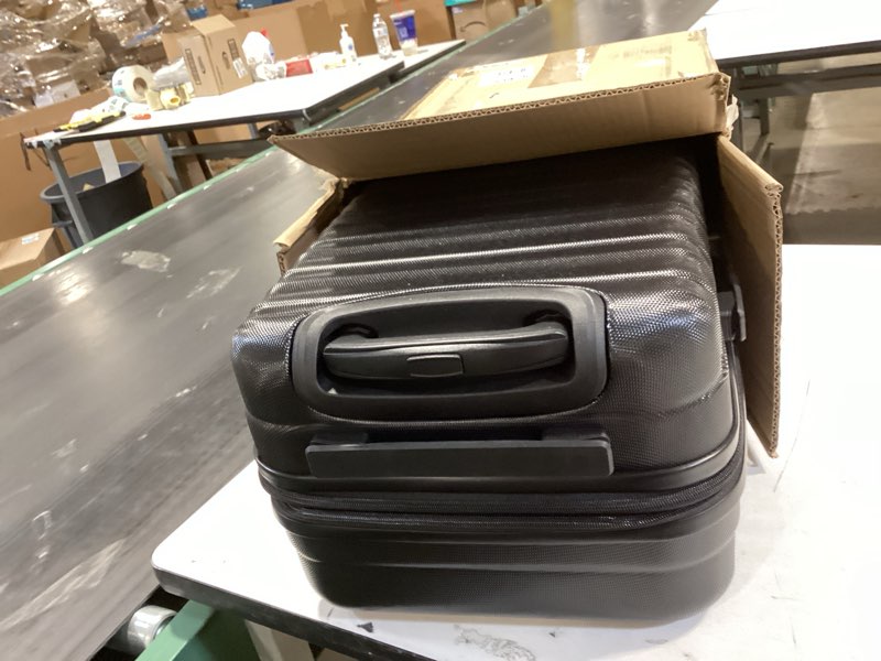 Condition photo showing Good Condition for Amazon Basics 21" Hardside Carry-On Luggage, Hardshell Suitcase With Wheels, Expandable For Up to 25% More Space, With Scratch-Resistant Surface, Four Multi-directional Wheels, Black Black Carry-On