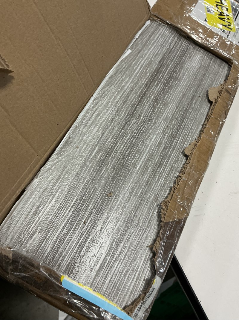 Condition photo showing Good Condition for art3d peel and stick floor tile vinyl wood plank 36-pack 54 sq.ft, light grey, rigid surface hard core easy diy self-adhesive flooring 36 x 6 x 0.1 inches light grey 36