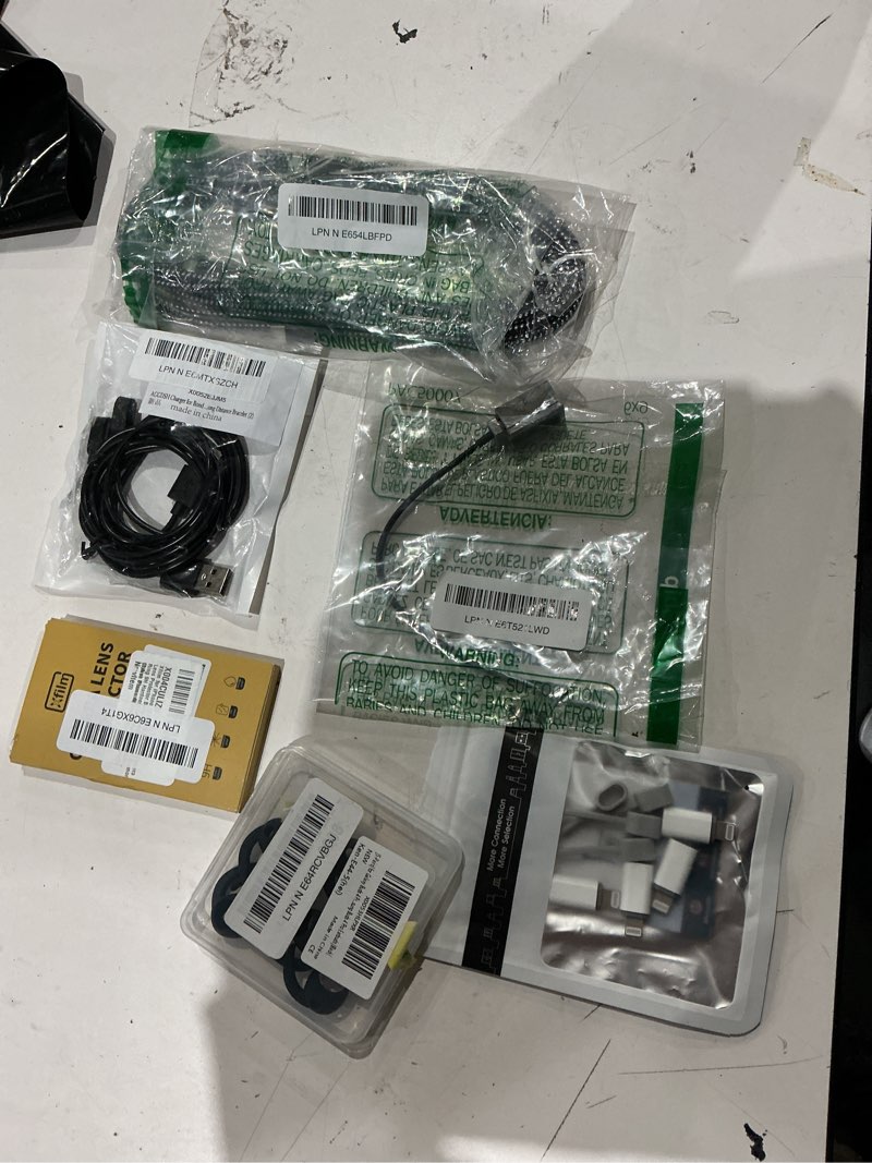 Condition photo showing As Is for assorted lot of electronics (headphones, small gadgets, headsets, etc.) 