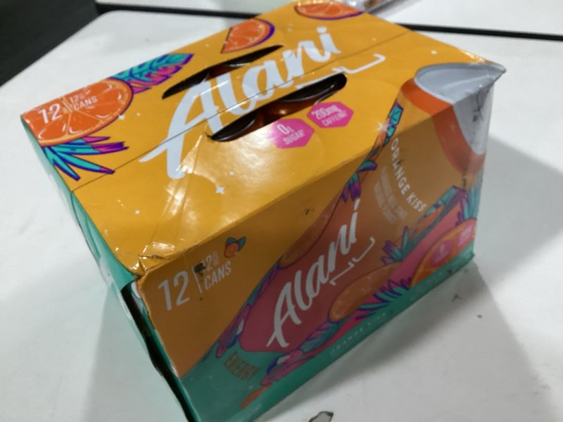Condition photo showing Good Condition for Alani Nu ORANGE KISS, Sugar Free, Low Calorie Energy Drinks, 200mg Caffeine, Biotin, B Vitamins, Zero Sugar, 10 Calories, 12 Fl Oz Cans, 12 Pack Orange Kiss 12 Fl Oz (Pack of 12)
