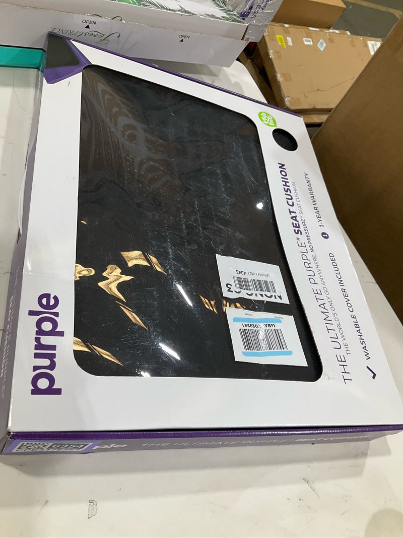 Condition photo showing New/Like New for purple ultimate seat cushion | pressure reducing grid designed for ultimate comfort | designed for gaming | made in the usa