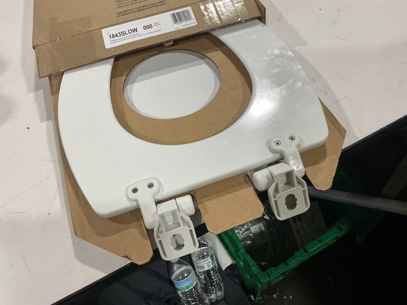 Condition photo showing As Is for mayfair linden slow close toilet seat, non slip heavy duty wood, easy install, elongated, white