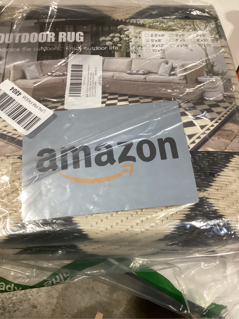 Condition photo showing Good Condition for HUGEAR Outdoor Rug for Patios Clearance,Waterproof Mat,Large Outside Carpet,Reversible Plastic Straw Camping Rugs,Rv,Porch,Deck,Camper,Balcony,Backyard (5x8,Checkered/Black&Beige) Checkered/Black&beige 5' x 8' (Rectangular)