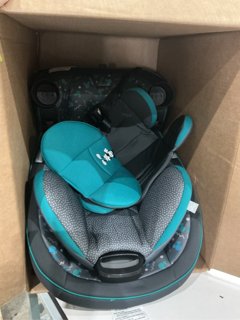 Condition photo showing Good Condition for disney grow and go convertible car seat, rear facing 5-40 pounds, forward facing 30-65 pounds, booster 40-100 lbs, convert from infant to toddler, mickey sprinkle