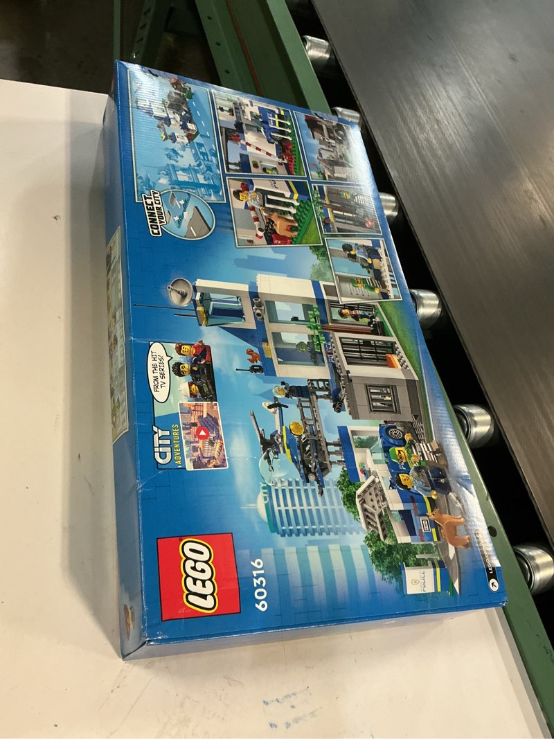Condition photo showing New/Like New for lego city police station with van, garbage truck & helicopter toy 60316, gifts for 6 plus year old kids, boys & girls with 5 minifigures and dog toy standard packaging