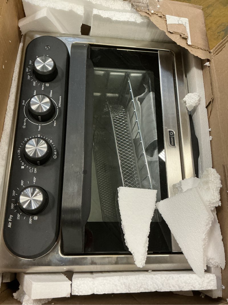 Condition photo showing As Is for ( incomplete missing some accessories) DASH Air Fry Multi Oven - 7 in 1 Convection Air Fry Oven with Non-stick Fry Basket, Baking Pan & Rack, 23L, 1500-Watt - Stainless Steel 23L Stainless Steel